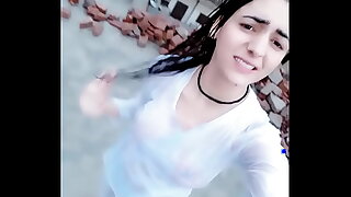 Big tits indian in rain see through